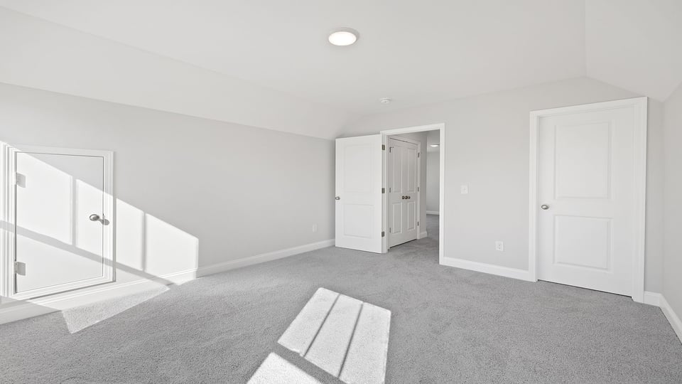 Bedroom with carpet.