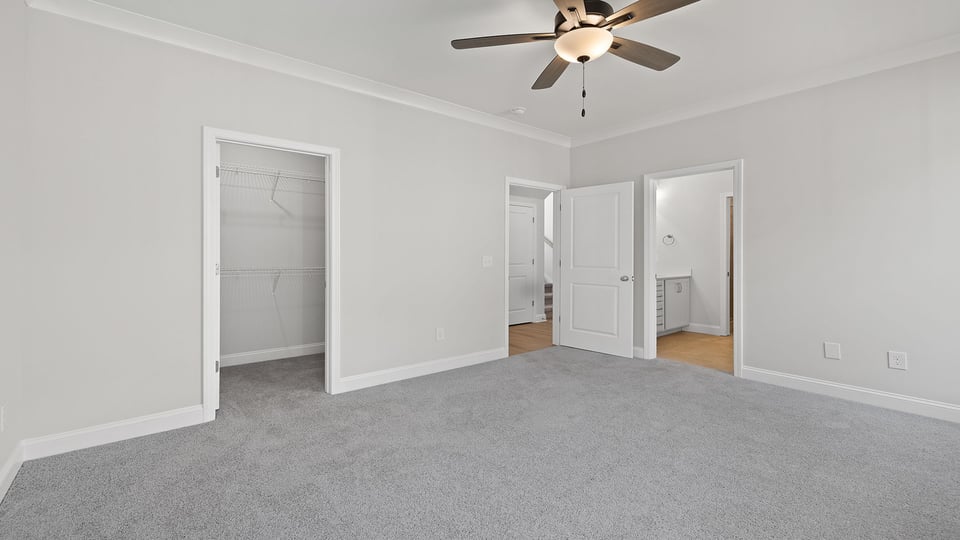 Bedroom with carpet.