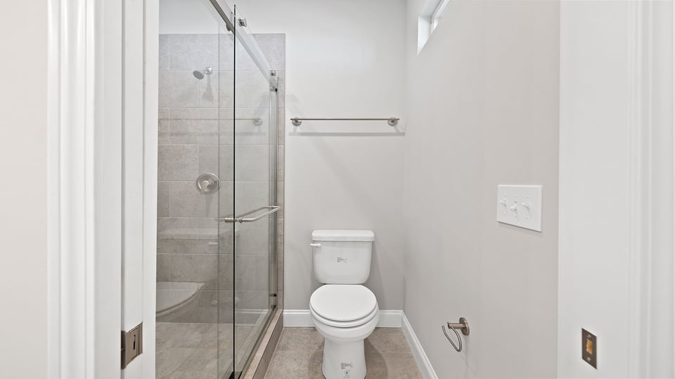 Bathroom with walk in shower.