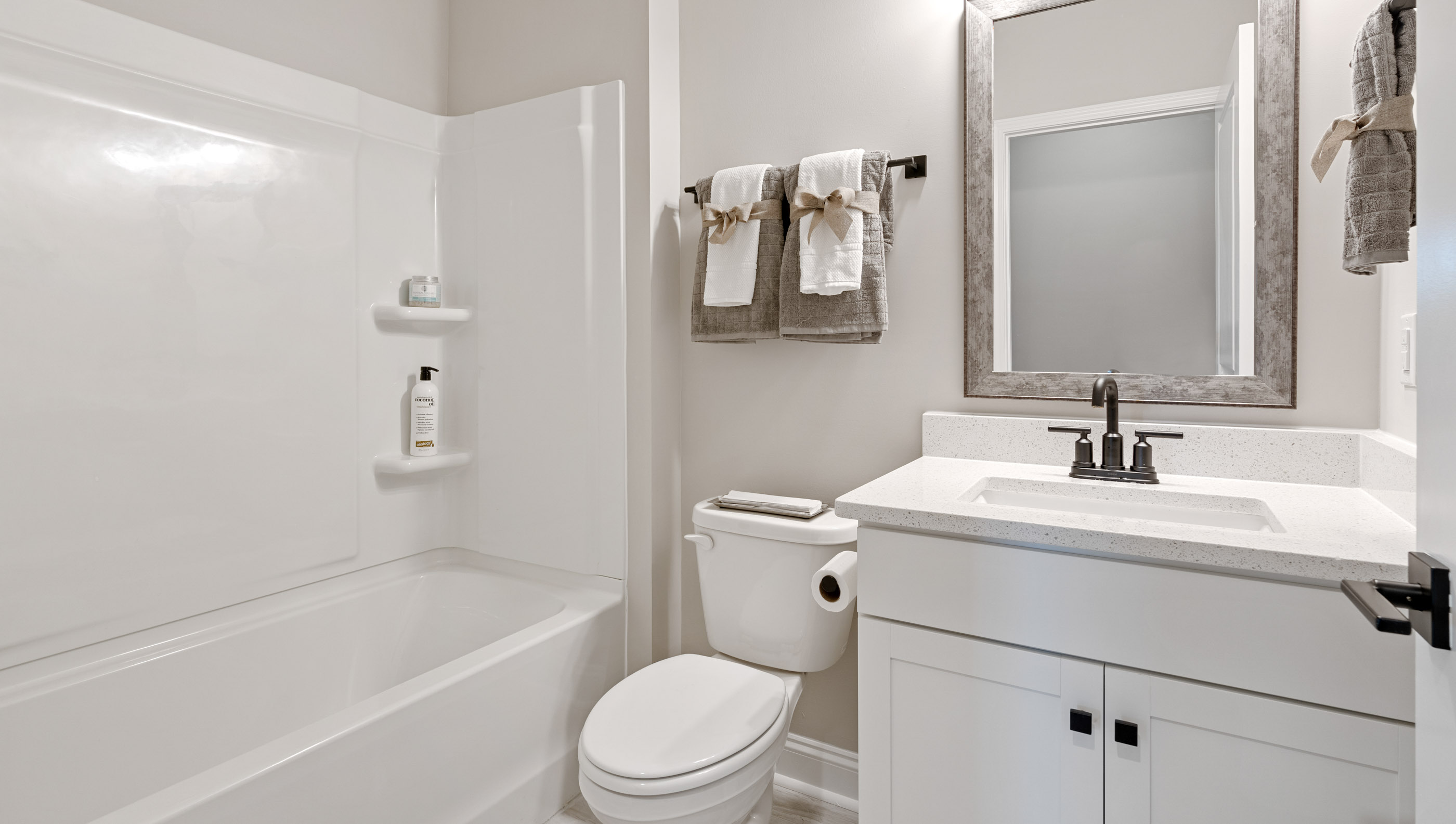 Bathroom with vanity and tub.