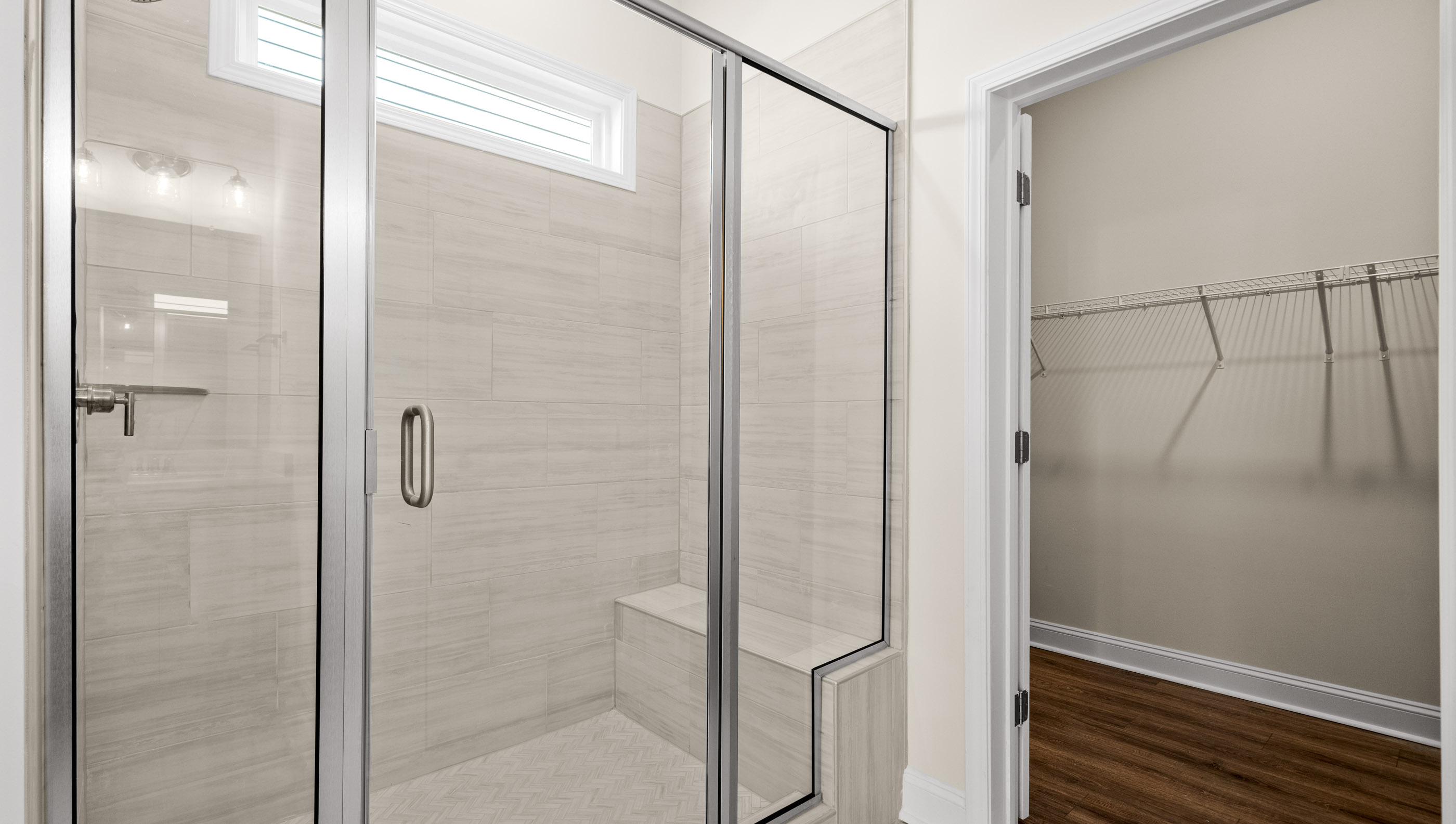 Bathroom with walk in shower.