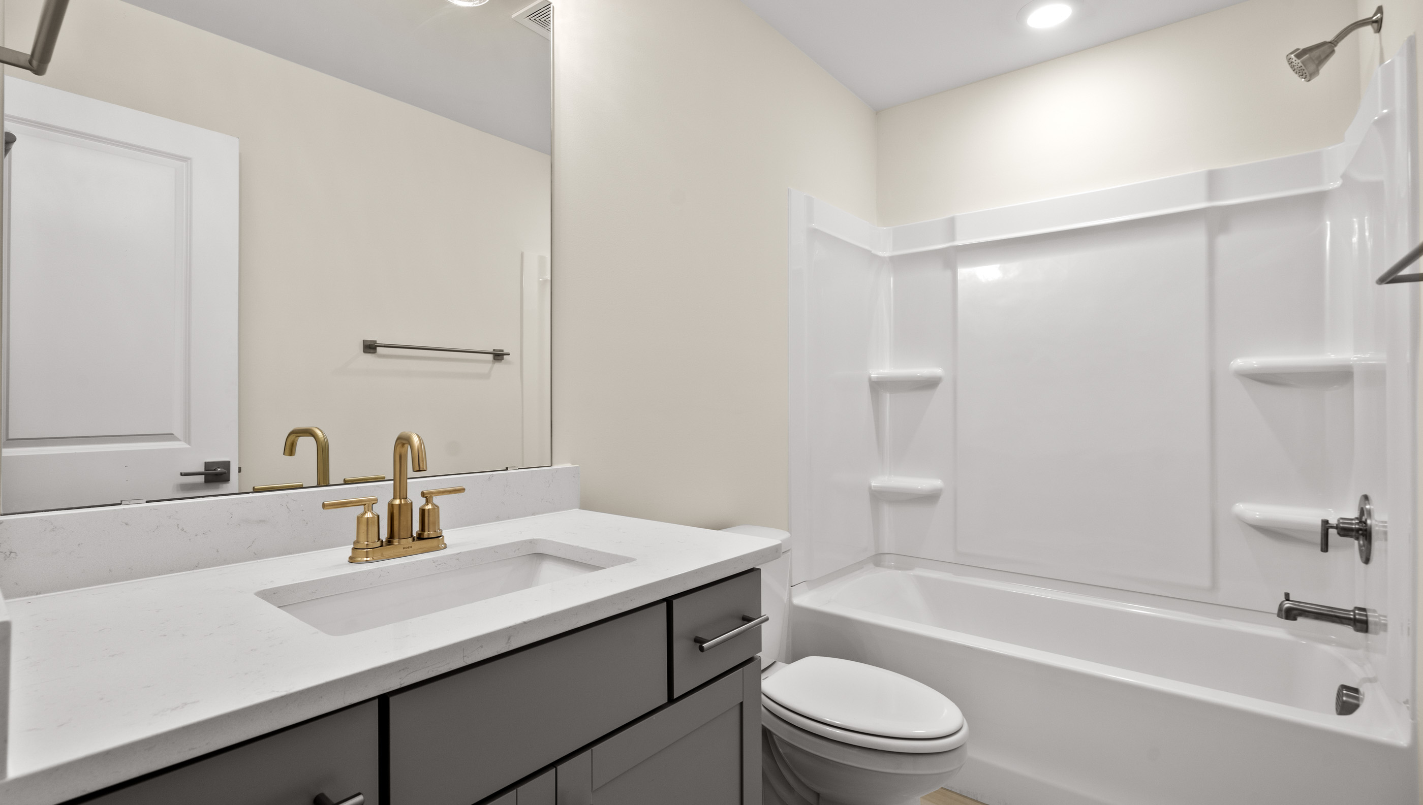 Bathroom with sink and tub.