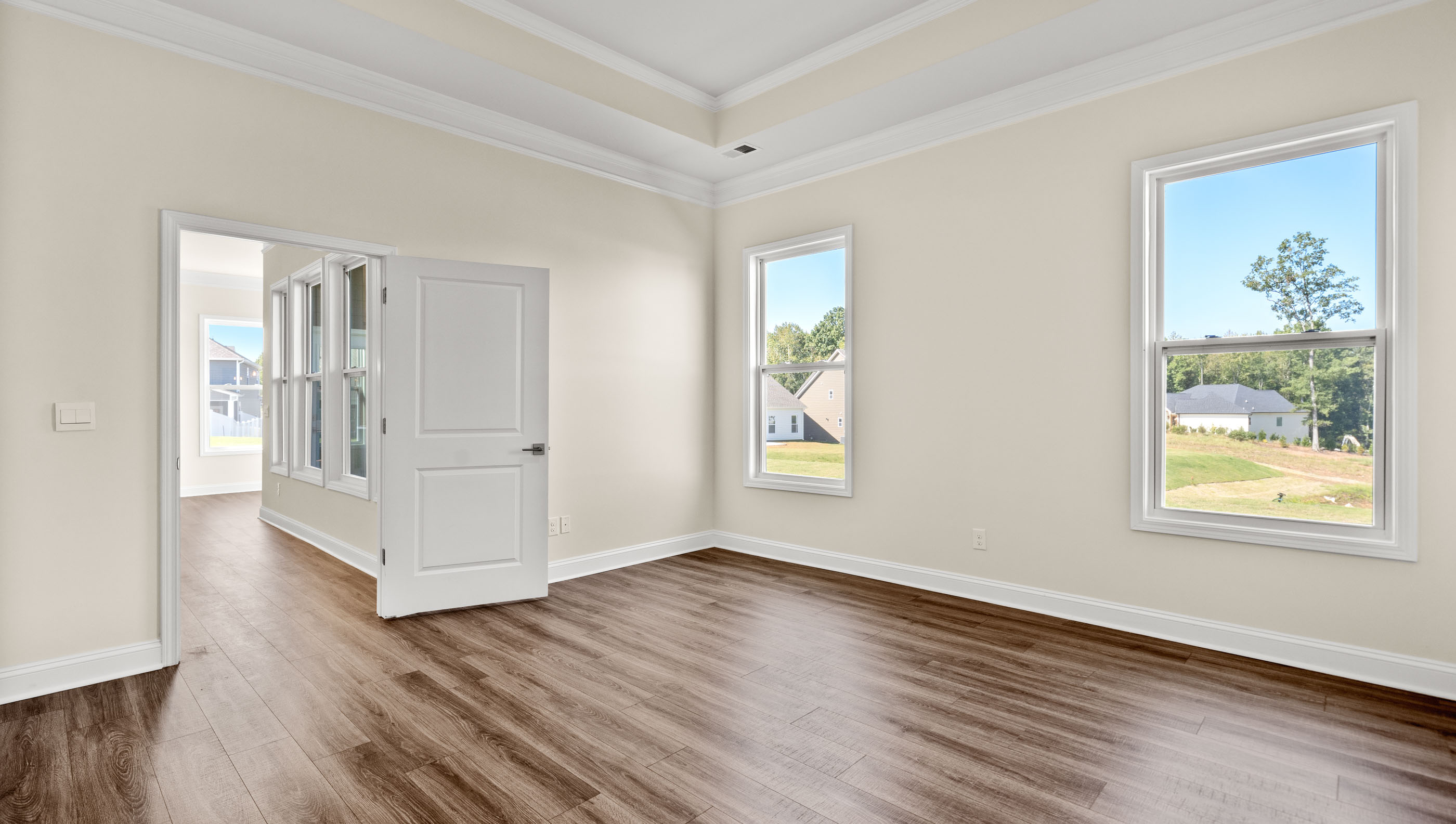 Family room with windows.