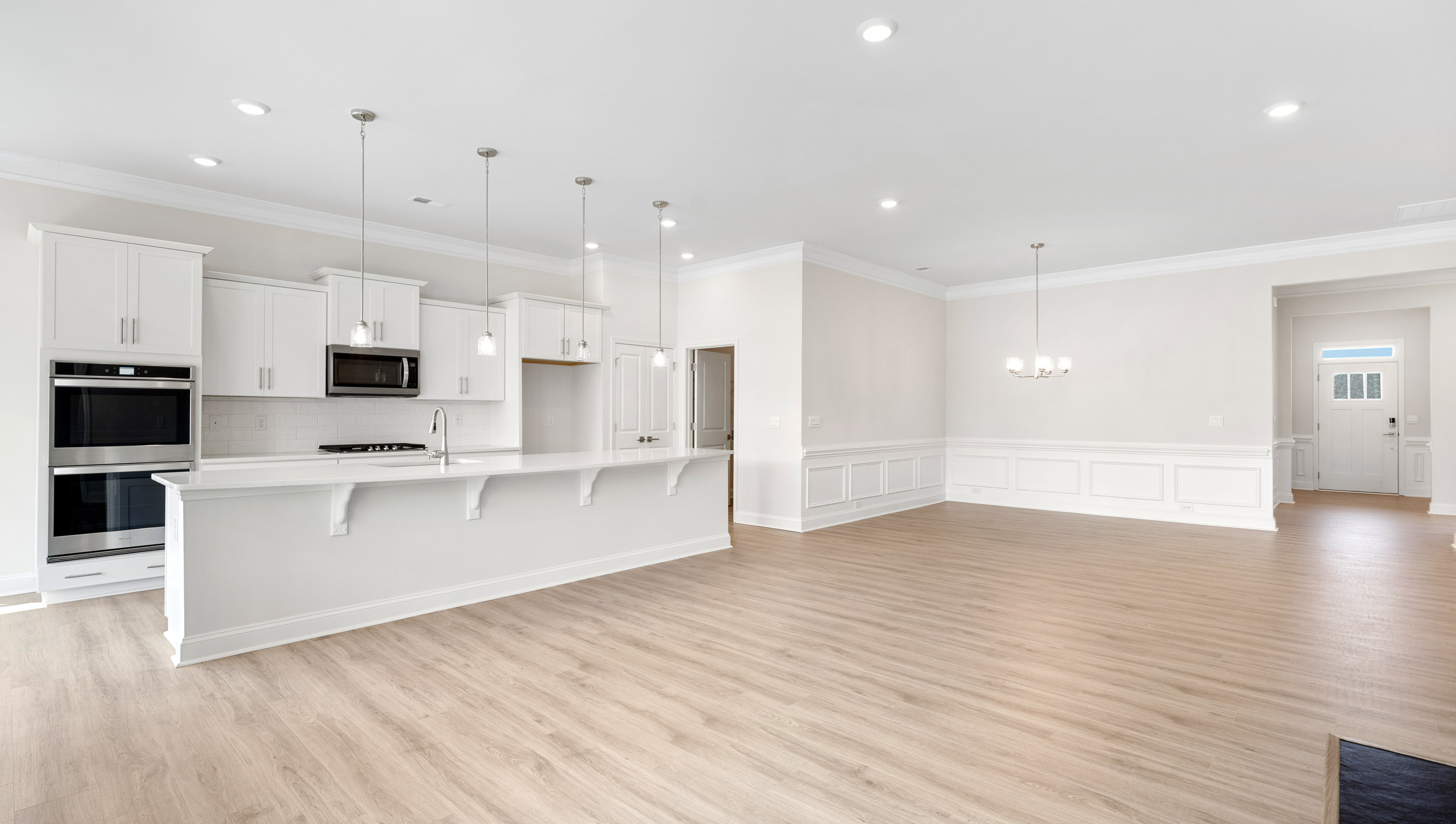 Family room with fireplace and window.
