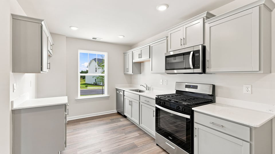 Kitchen with stainless steel appliances.