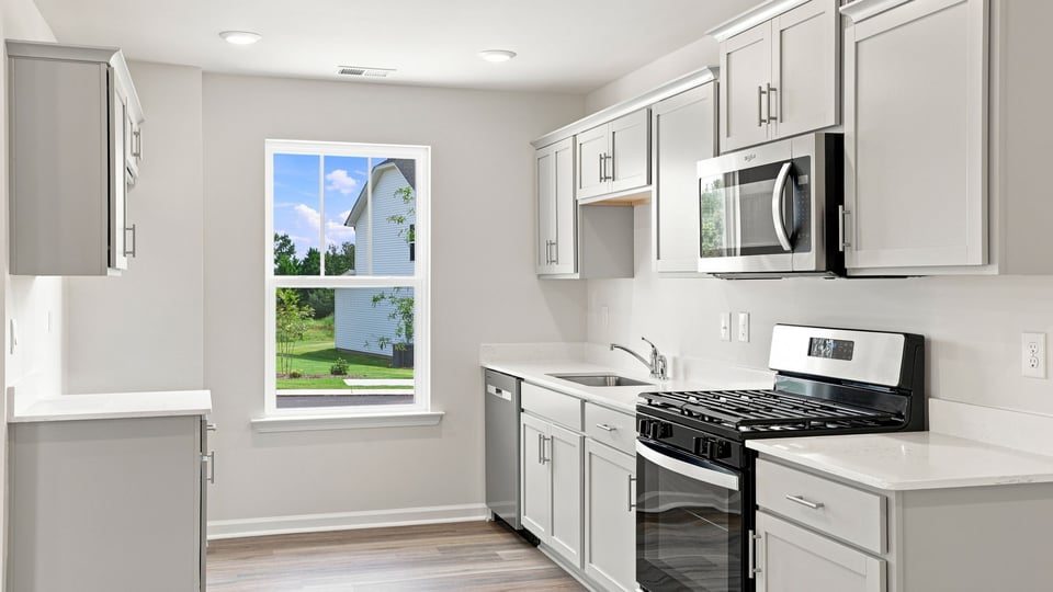 Kitchen with stainless steel appliances.