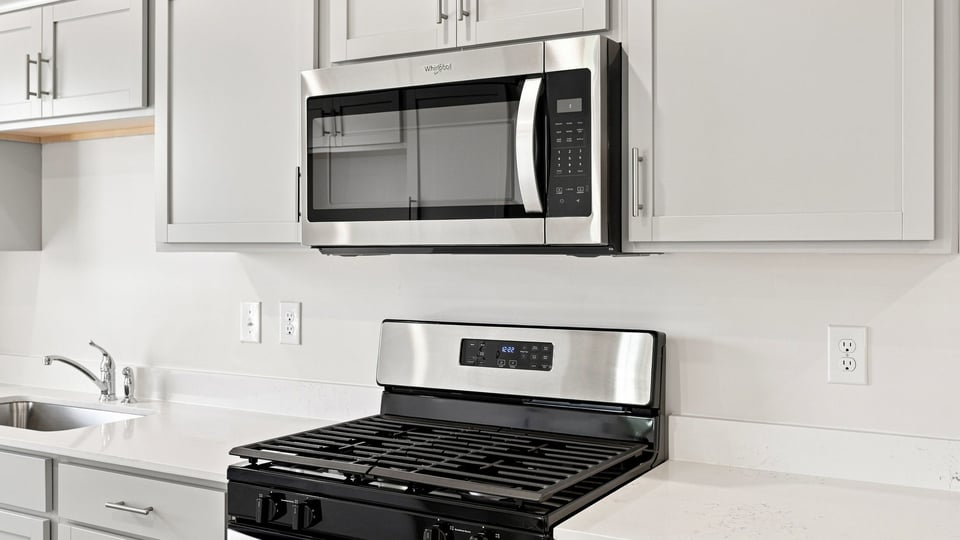 Kitchen with stainless steel appliances.
