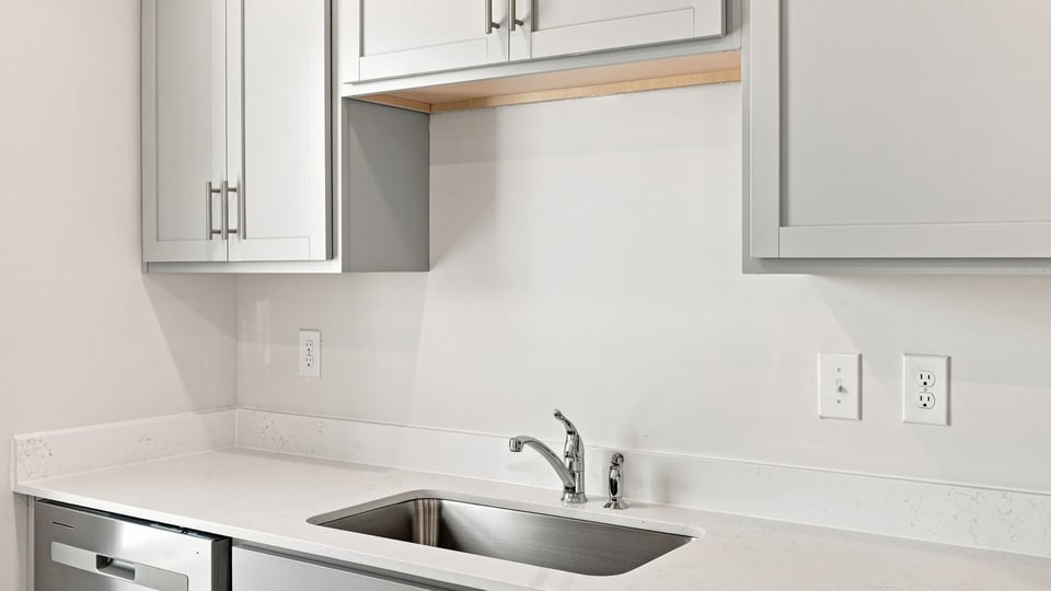 Kitchen with stainless steel appliances.