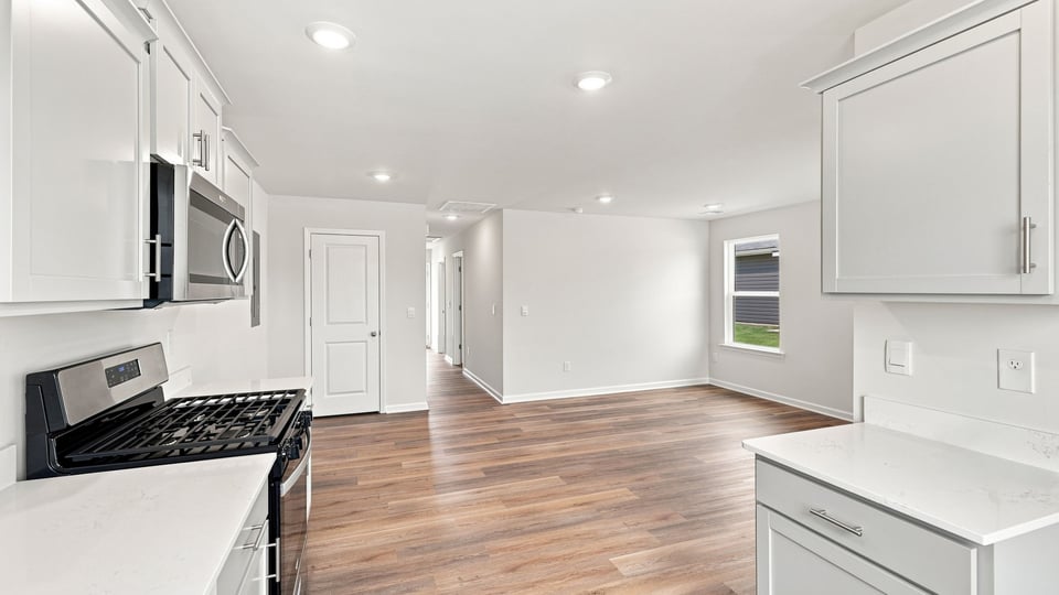 Kitchen with stainless steel appliances.