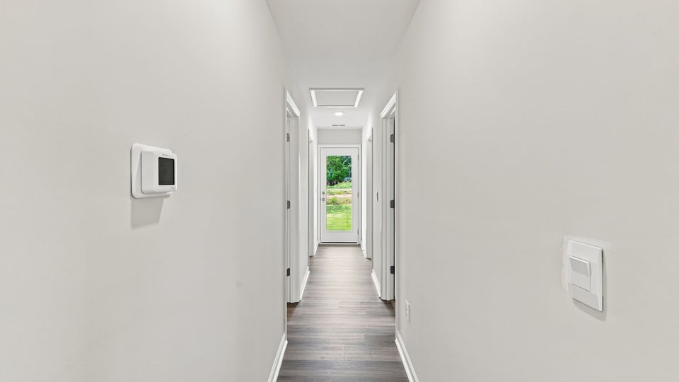Hallway view of rooms.