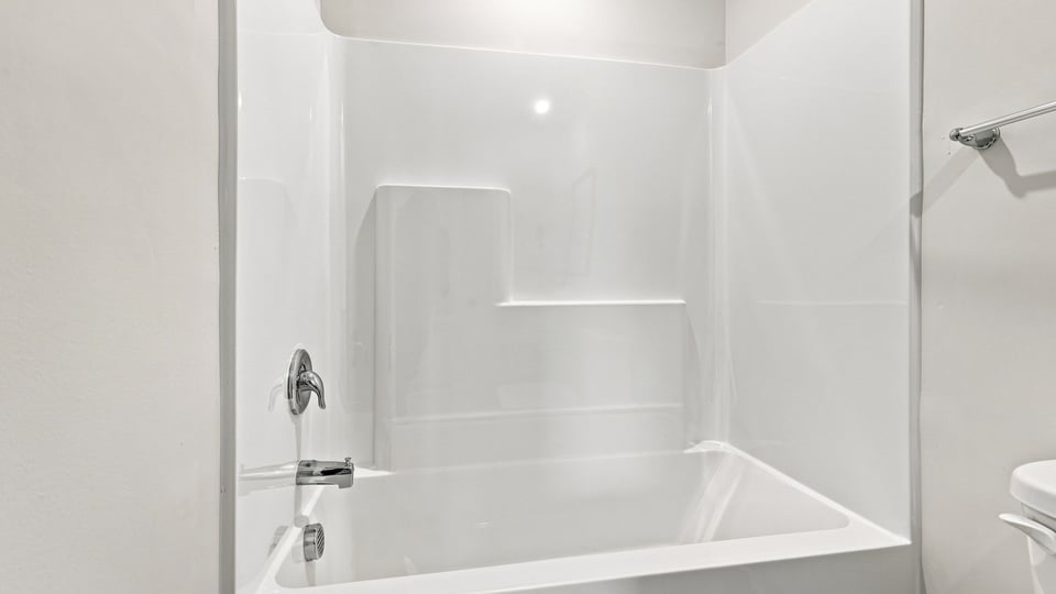 Bathroom with bathtub.