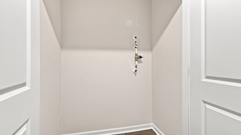 Closet with hanging storage racks.