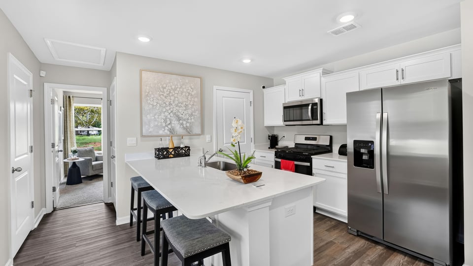 Kitchen with quartz countertops.