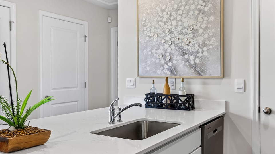 Kitchen with quartz countertops.
