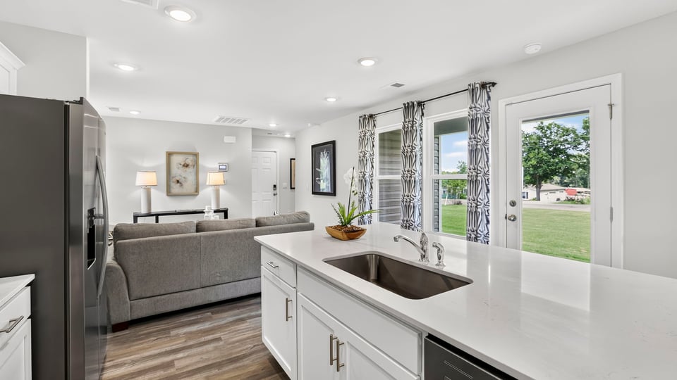 Kitchen with quartz countertops.