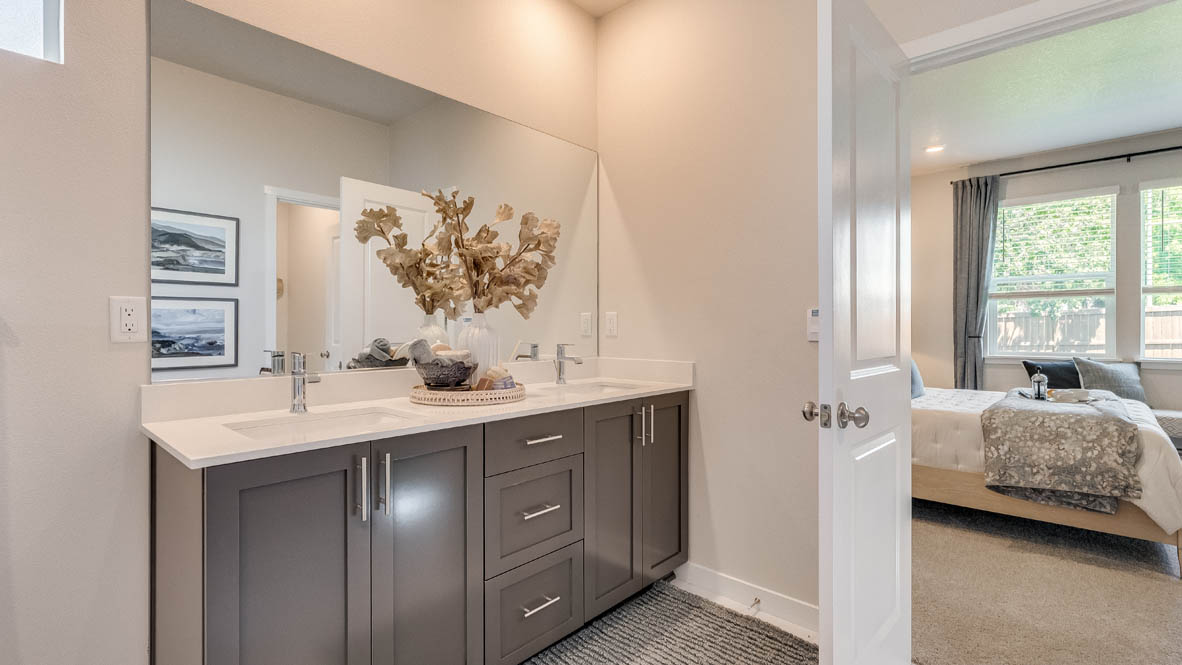 Landau Heights Primary Bathroom with double sink vanity and white quartz countertops