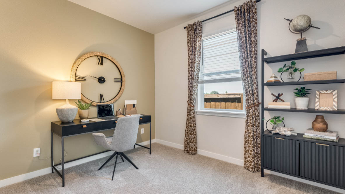 Landau Heights bedroom with carpet and office desk den set up and bookshelves
