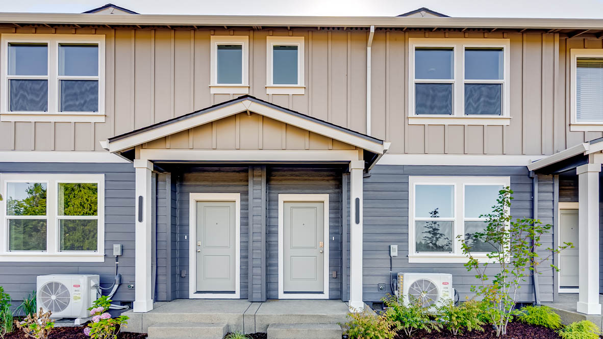 Terrace at Pleasant Valley Laundry room with white walls, decorations, and white wire shelving