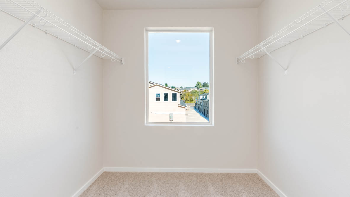 Terrace at Pleasant Valley walk in closet with window, and white wire shelving