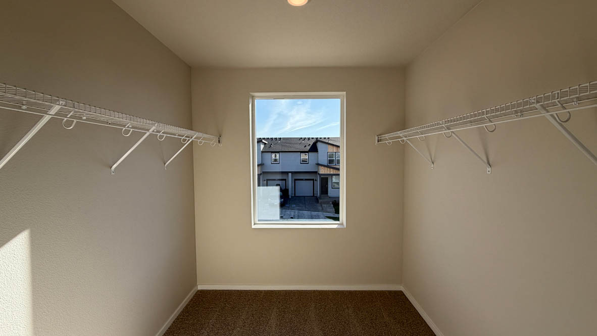 Terrace at Pleasant Valley walk in closet with window, and white wire shelving