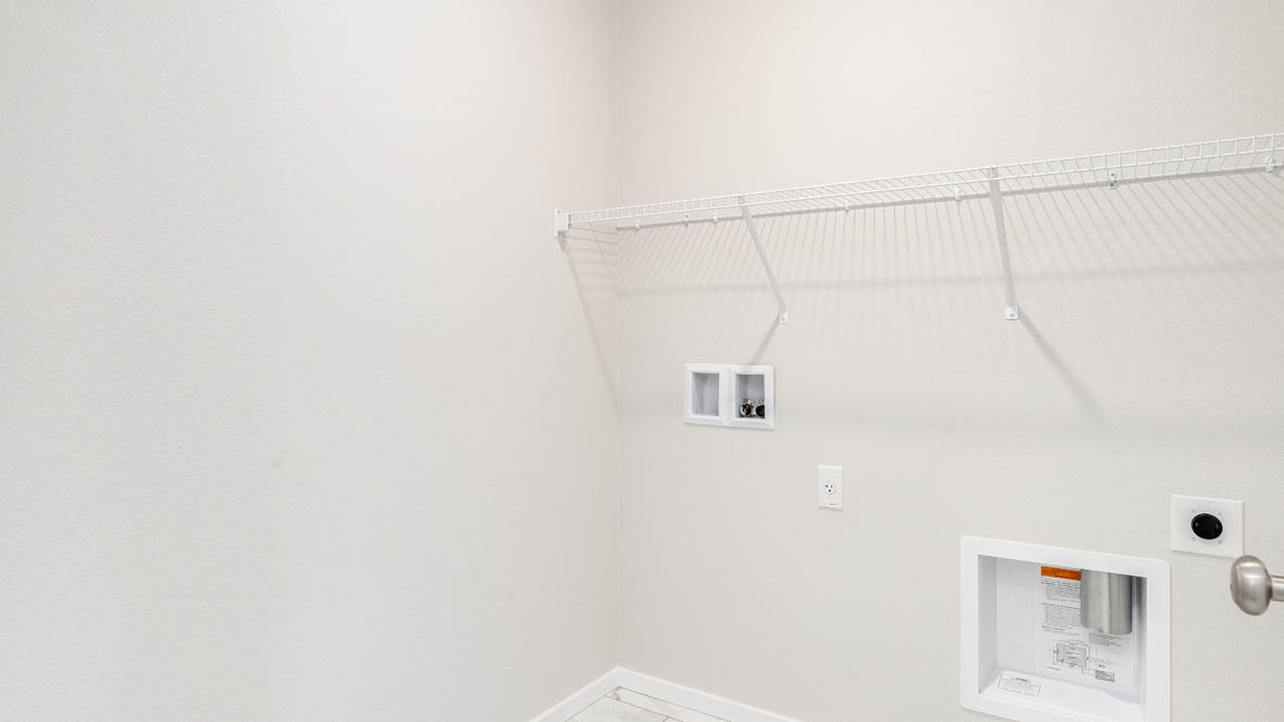 Terrace at Pleasant Valley laundry room with white wire shelving