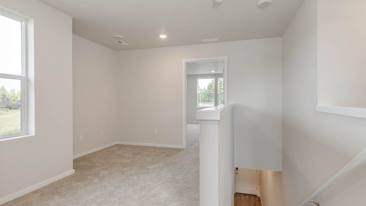 Terrace at Pleasant Valley upstairs hallway with carpeting and windows