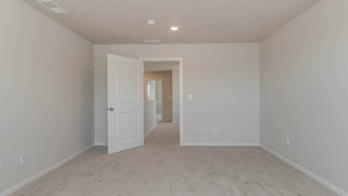 Terrace at Pleasant Valley primary bedroom with carpeting and windows and en suite bathroom