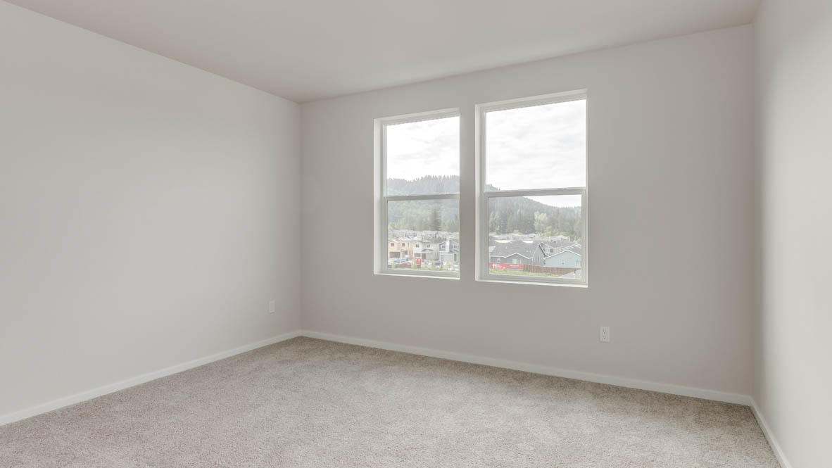 Terrace at Pleasant Valley bedroom with windows and white walls and carpeting
