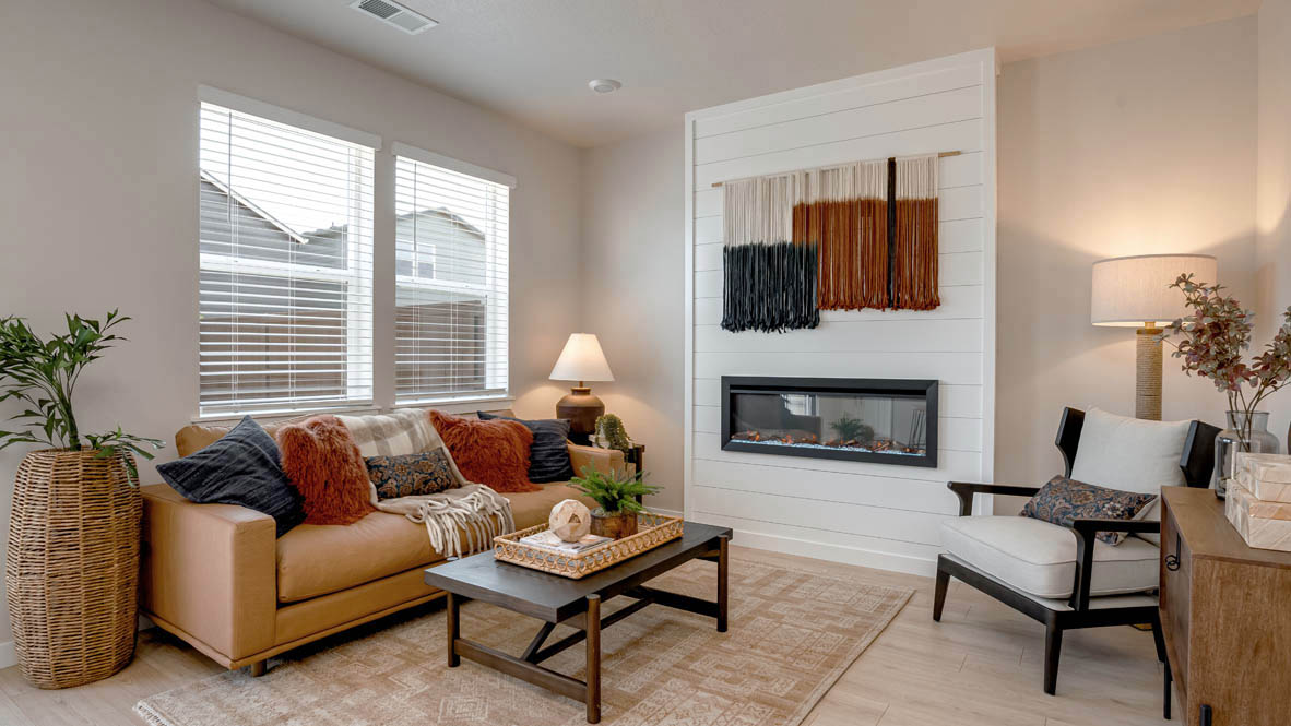 Butler Creek Crossing great room with electric fireplace and floor to ceiling shiplap wall