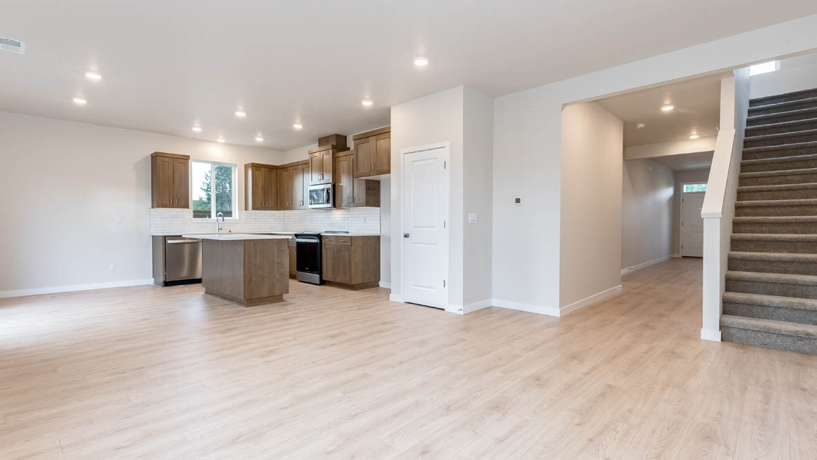 Butler Creek Crossing great room with laminate flooring,