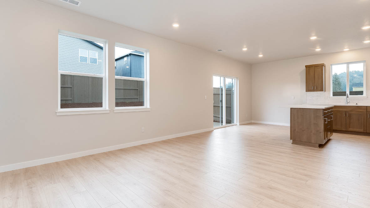 Butler Creek Crossing great room with laminate flooring,