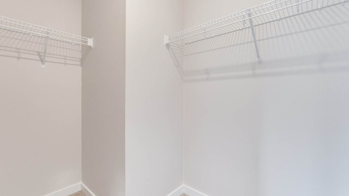Butler Creek Crossing walk in closet with white wire shelving