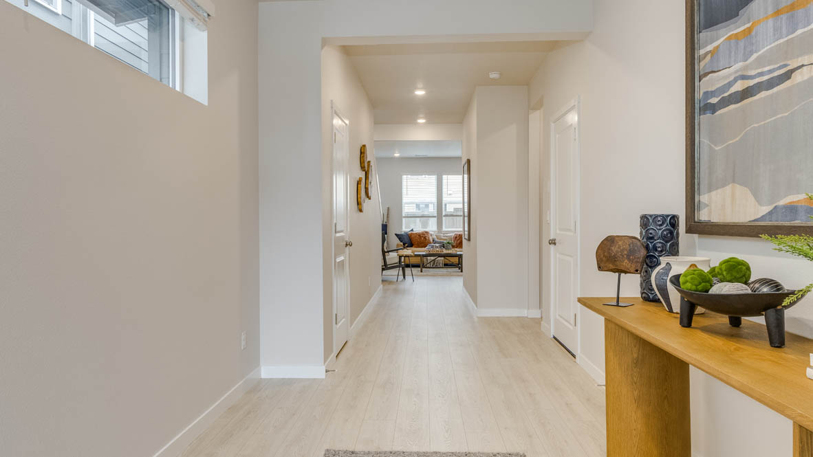Butler Creek Crossing Entry with laminate flooring and window