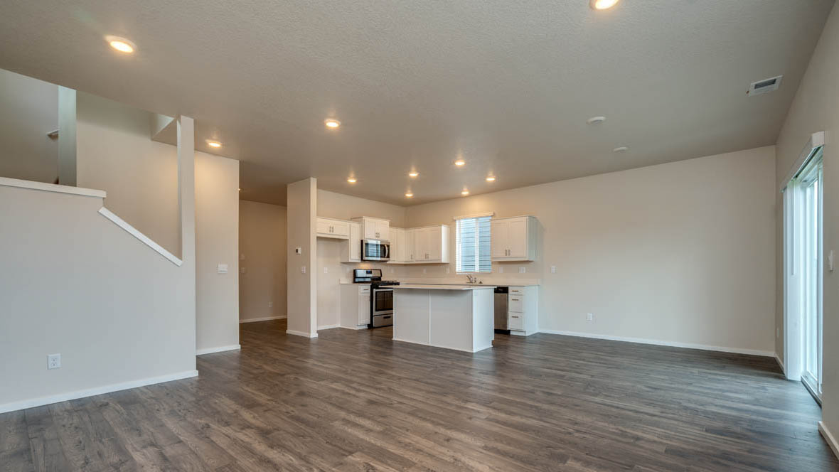 East Park Village great room with laminate flooring and white walls
