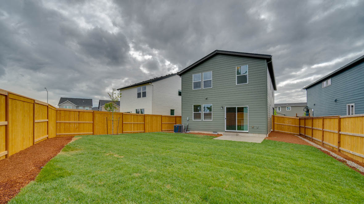 East Park Village backyard with fencing and patio