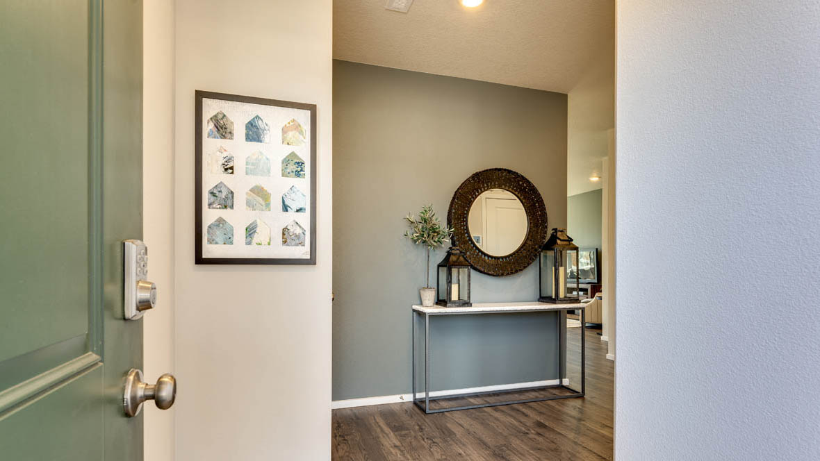 East Park Village entryway with laminate flooring and accent wall