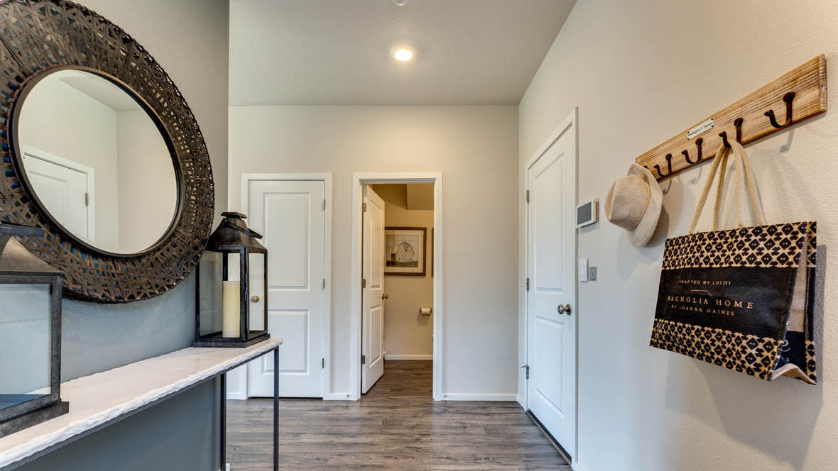 East Park Village entryway with laminate flooring and accent wall