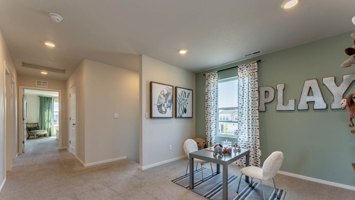 East Park Village loft with carpet, accent wall, and window