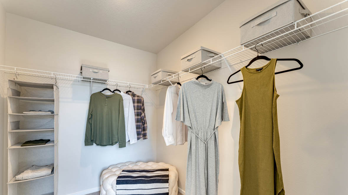 East Park Village walk in closet with carpet and white wire shelving