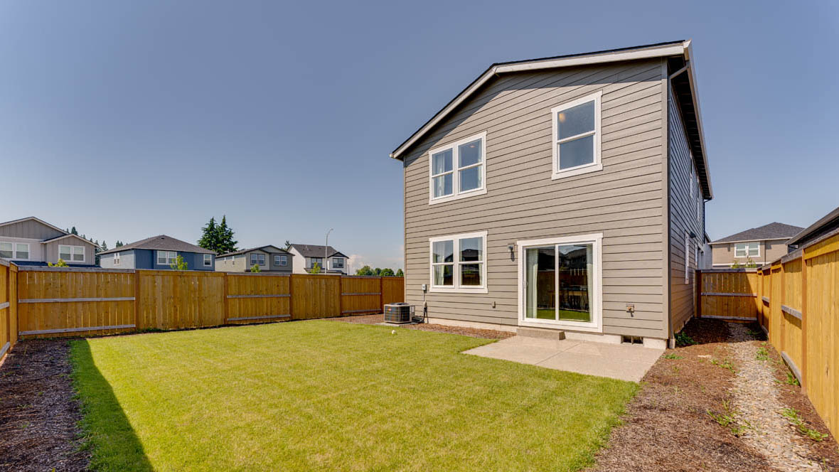 East Park Village backyard with fencing and patio