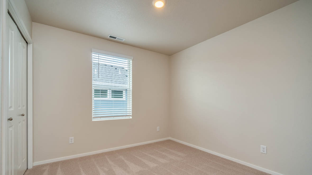 East Park bedroom with carpet and window