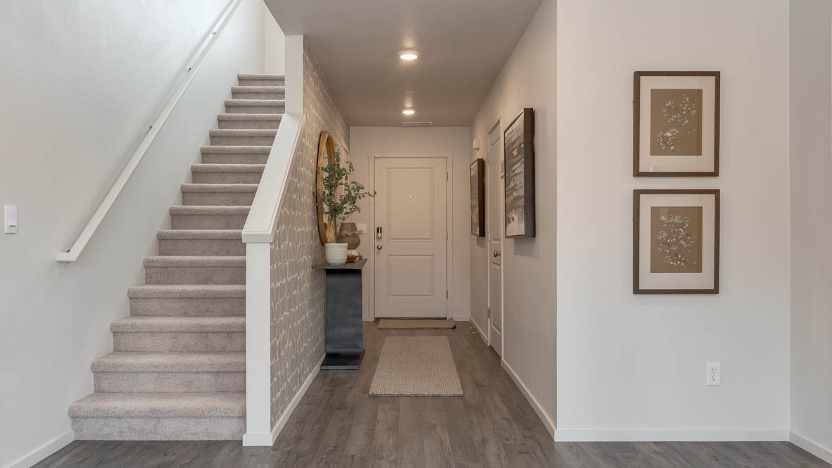 East Park Village Entry with laminate flooring, and staircase