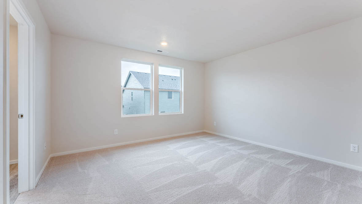 East Park Village Primary Bedroom with carpet, windows, closet