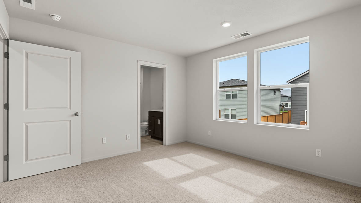 Addysen Park primary bedroom with carpet, window, and white walls