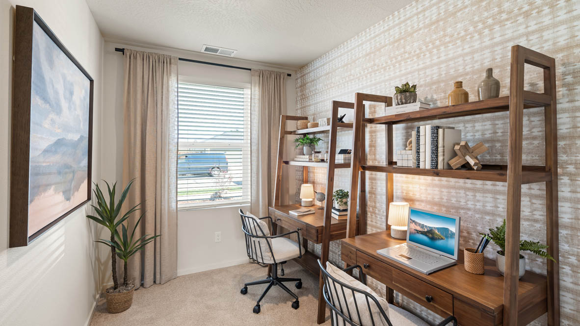 Addysen Park den with office set up and book shelves