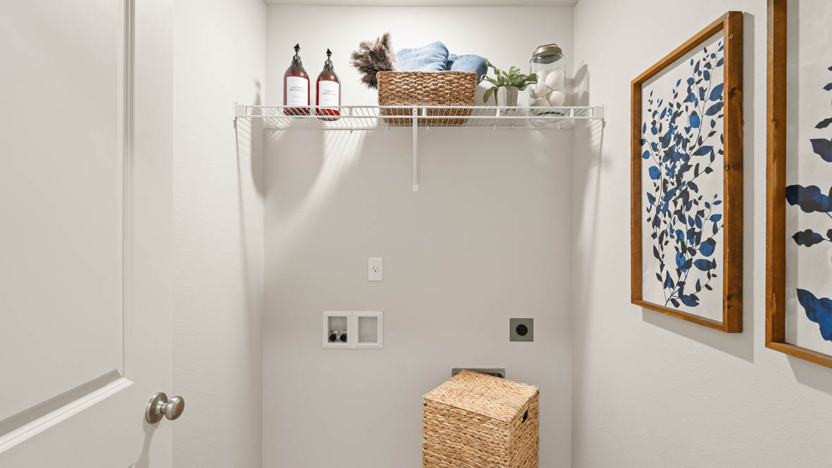 Addysen Park laundry room with white wire shelving