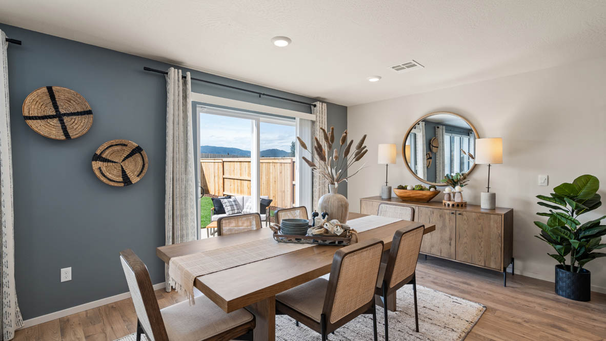 Addysen Park dining room with six place settings and a hutch