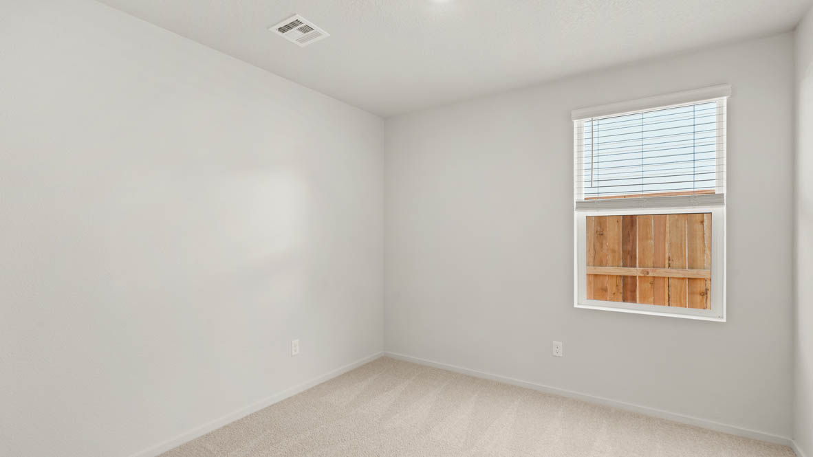 Addysen Park bedroom with carpet, window, and white walls