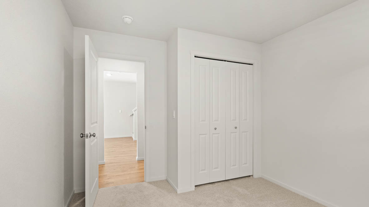 Addysen Park bedroom with carpet, window, and white walls