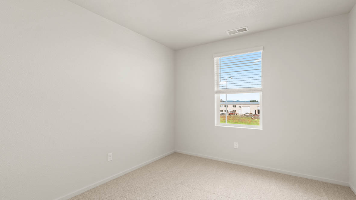 Addysen Park bedroom with carpet, window, and white walls